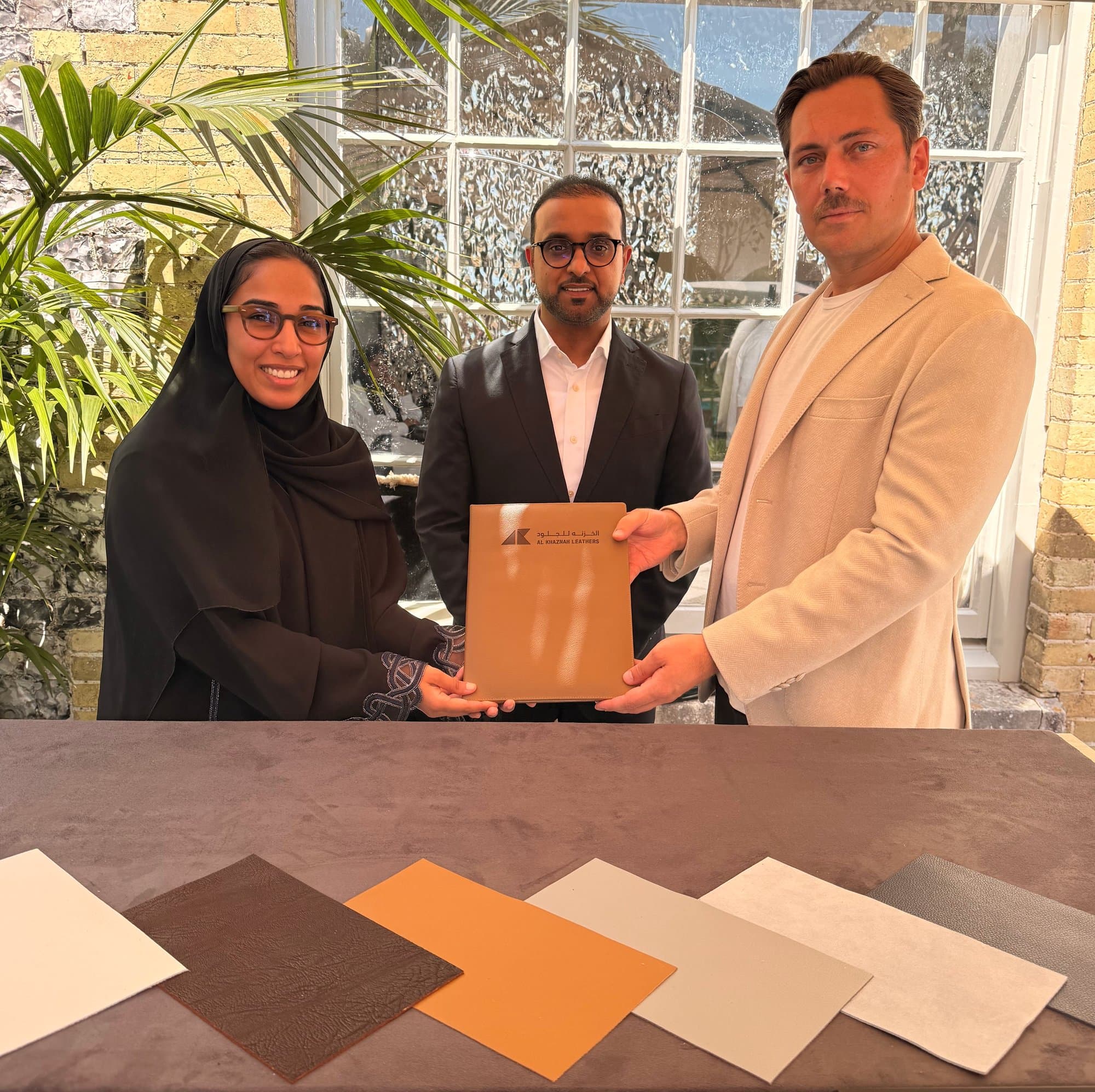 Shamsa Alahbabi (Al Khaznah Leathers) with Karim Ghamraoui (ADIO) and Pascal Staud (HOF) at the Orangery, Goodwood - the material unveiling